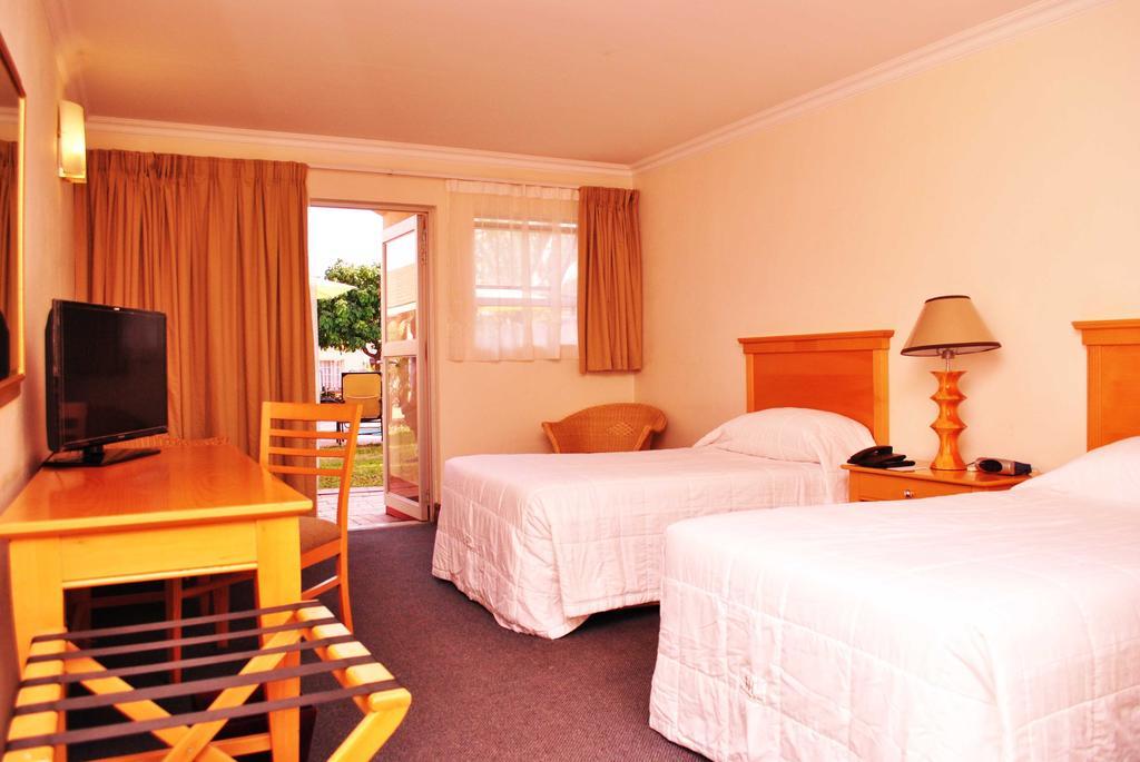 The George Hotel Manzini Pokoj fotografie