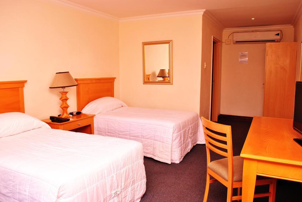 The George Hotel Manzini Pokoj fotografie